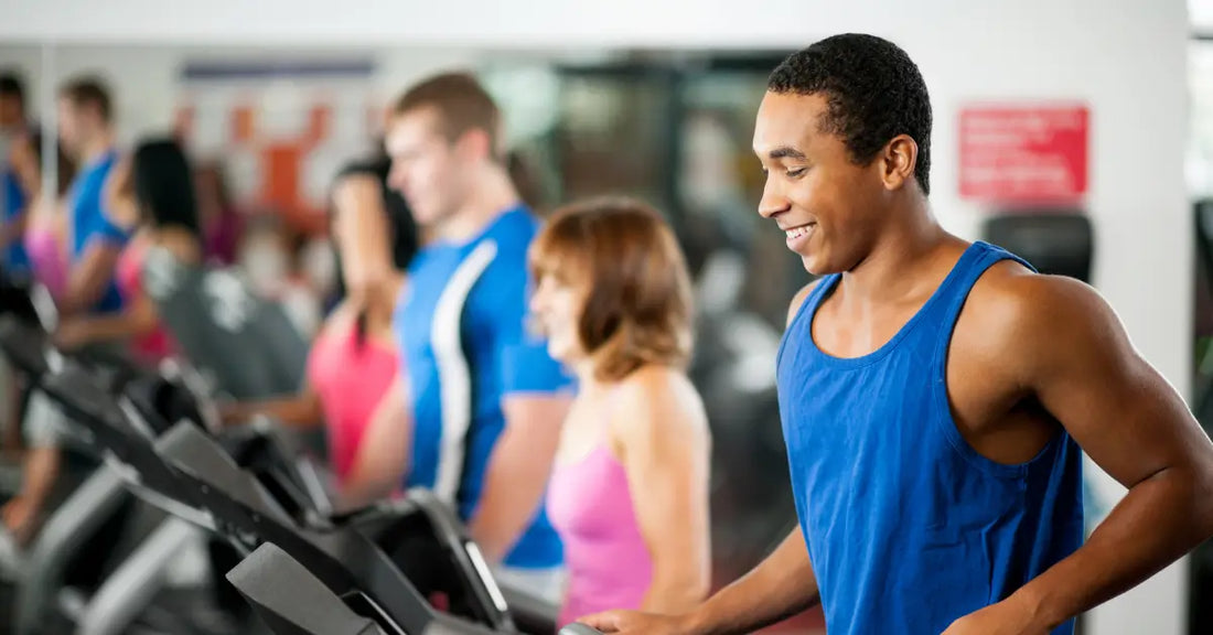 Group of people on treadmills, highlighting the use of protein powder after cardio