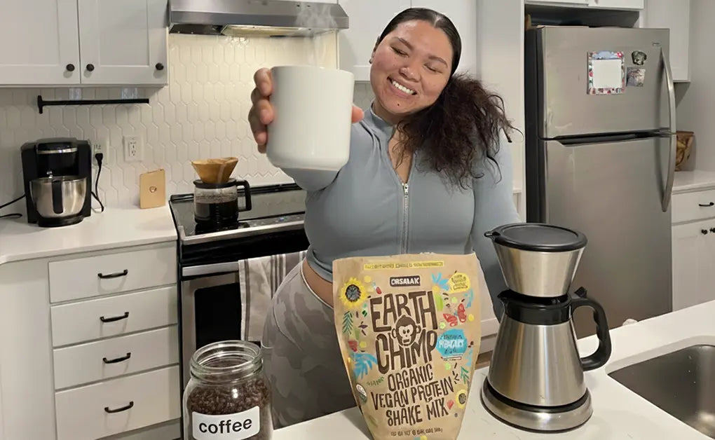 Woman Flexing the Best Protein Powders for Coffee That Blend Smoothly