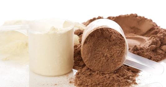 Scoops of different protein powders, questioning if protein powder is vegan